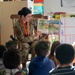 90 MW Airmen read to local students