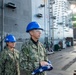 USS Ronald Reagan (CVN 76) Sailors conduct morning colors