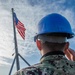 USS Ronald Reagan (CVN 76) Sailors conduct morning colors