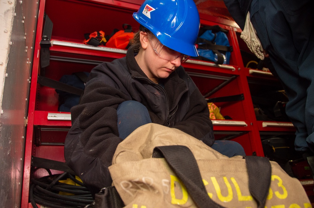 USS Ronald Reagan (CVN 76) Sailors conduct a repair locker inspection