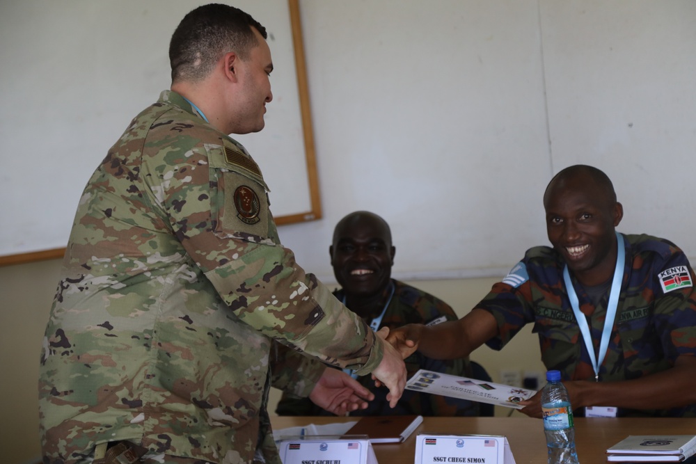 U.S. Air Force 818th Mobility Support Advisory Squadron presents certificate of appreciation to Kenyan Soldiers