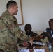 U.S. Air Force 818th Mobility Support Advisory Squadron presents certificate of appreciation to Kenyan Soldiers