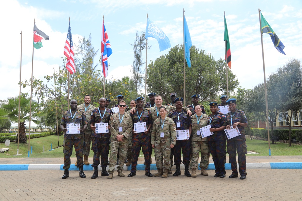 U.S. Air Force 818th Mobility Support Advisory Squadron presents certificate of appreciation to Kenyan Soldiers