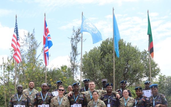 U.S. Air Force 818th Mobility Support Advisory Squadron presents certificate of appreciation to Kenyan Soldiers