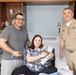 Capt. David G. Lang Presents Gift from Walter Reed to Leap Babies