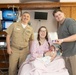 Capt. David G. Lang Presents Gift from Walter Reed to Leap Babies