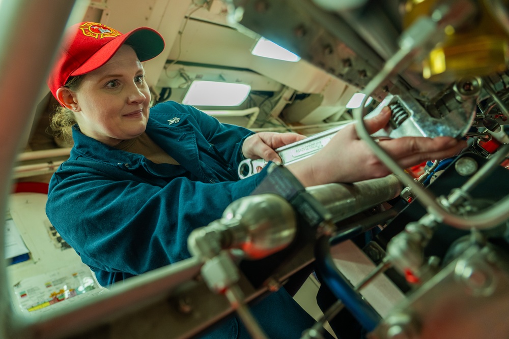 Bougainville Sailor Working on USS Iwo Jima