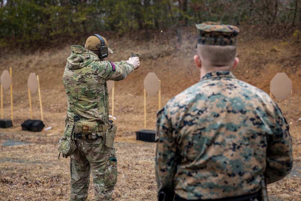 British Royal Marines conduct shooting drills with U.S. Marines during Operation Longshot