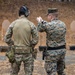 British Royal Marines conduct shooting drills with U.S. Marines during Operation Longshot