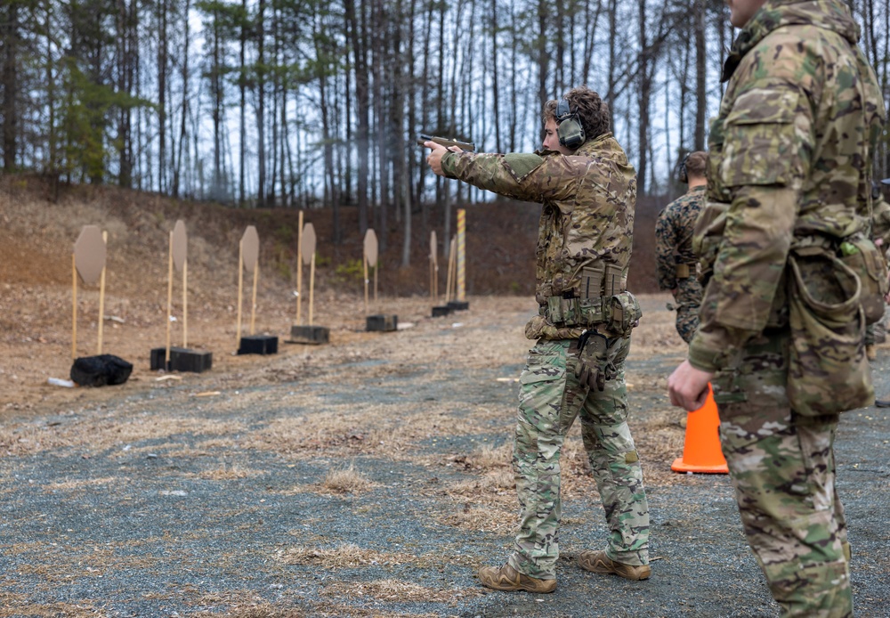 British Royal Marines conduct shooting drills with U.S. Marines during Operation Longshot