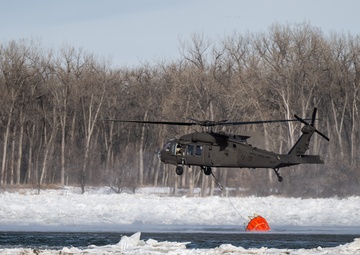 North Dakota National Guard UH-60 Black Hawk Helicopters Fight Missouri River Ice Jams