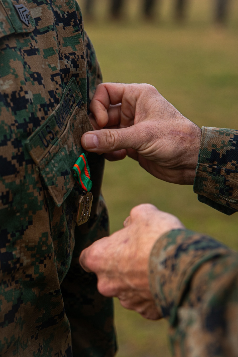 Two Marines awarded for exceeding expectations and their commitment to their mission