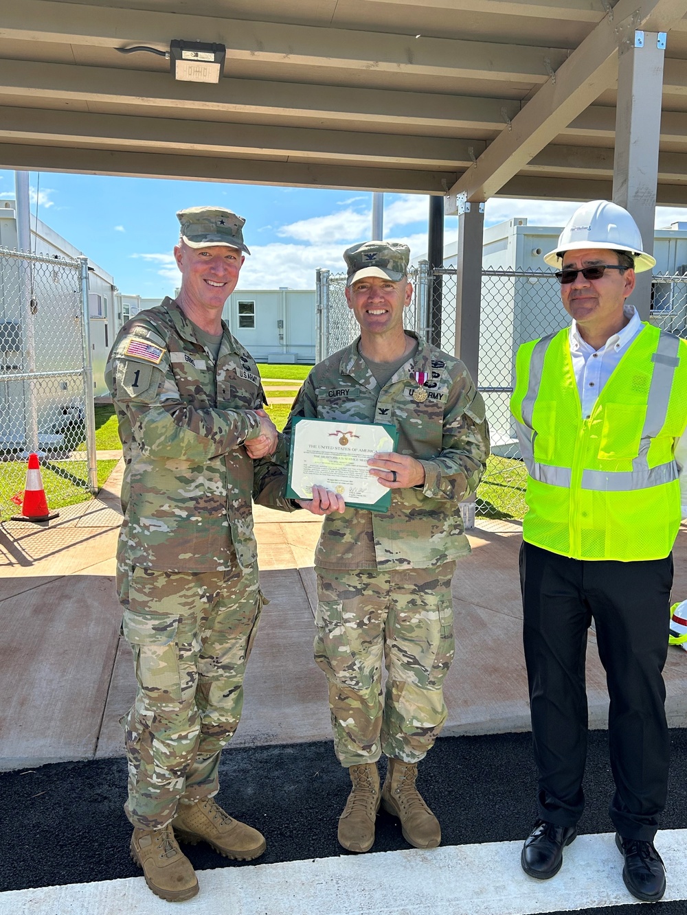 Col. Jess Curry receives the Meritorious Service Medal Award