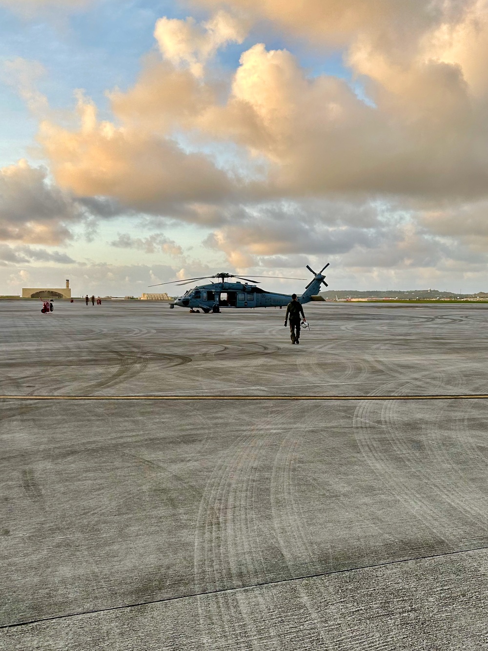 U.S. Coast Guard, Navy Helicopter Squadron execute critical medical evacuation of Filipino mariner northwest of Guam