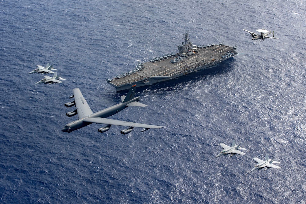 U.S. Air Force, U.S. Navy Fly Together Over USS Theodore Roosevelt
