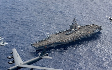 U.S. Air Force, U.S. Navy Fly Together Over USS Theodore Roosevelt