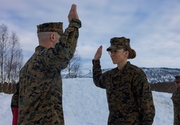 U.S. Marine with 2nd Marine Aircraft Wing reenlists in Norway