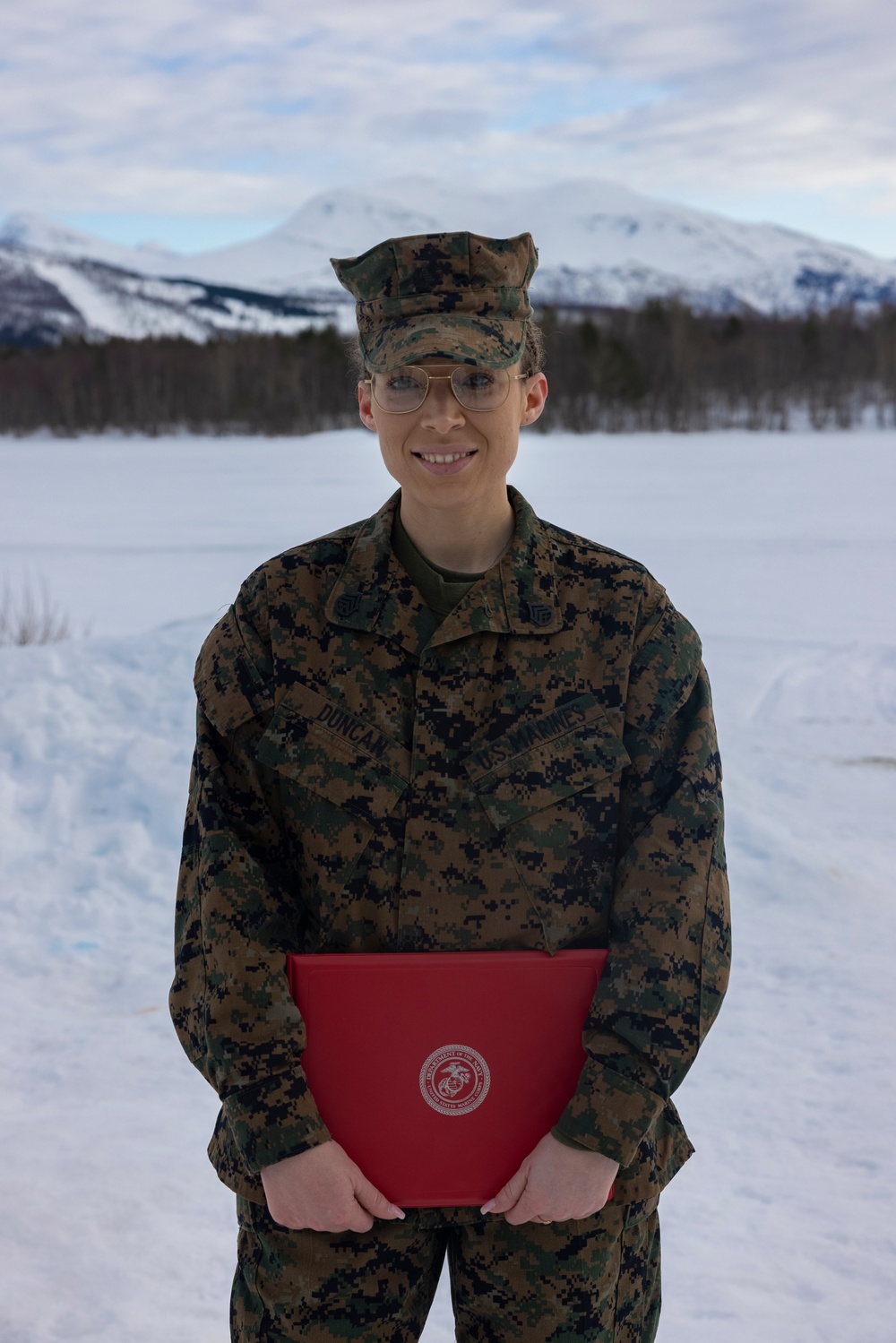 U.S. Marine with 2nd Marine Aircraft Wing reenlists in Norway