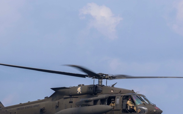 16th CAB Escorts RDML Christopher D. Stone and Conducts Deck Landing on USS Somerset (LPD-25)