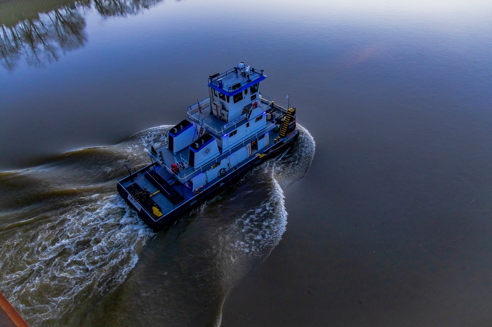Barge traffic moves through port of Pittsburgh at sunrise