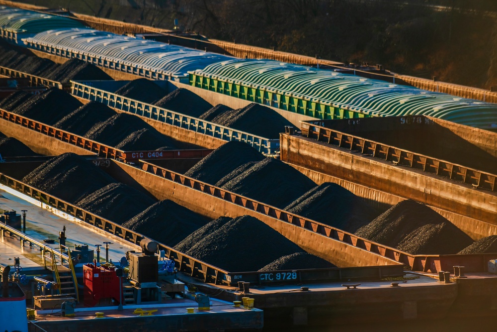 Barge traffic moves through port of Pittsburgh at sunrise