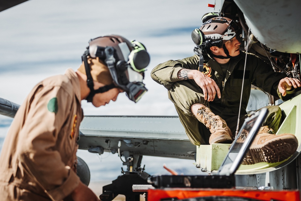 HMLA-267 Marines conduct maintenance on light attack helicopters during SLTE 2-24