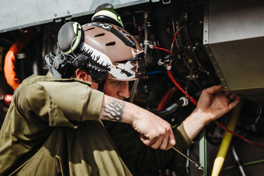 HMLA-267 Marines conduct maintenance on light attack helicopters during SLTE 2-24