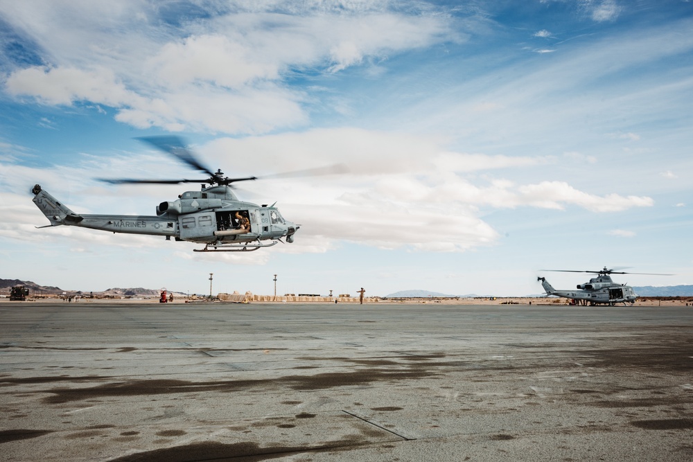 HMLA-267 Marines conduct maintenance on light attack helicopters during SLTE 2-24