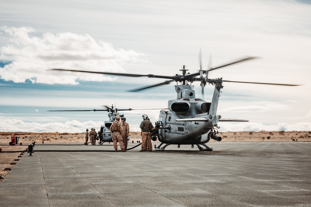 HMLA-267 Marines conduct maintenance on light attack helicopters during SLTE 2-24