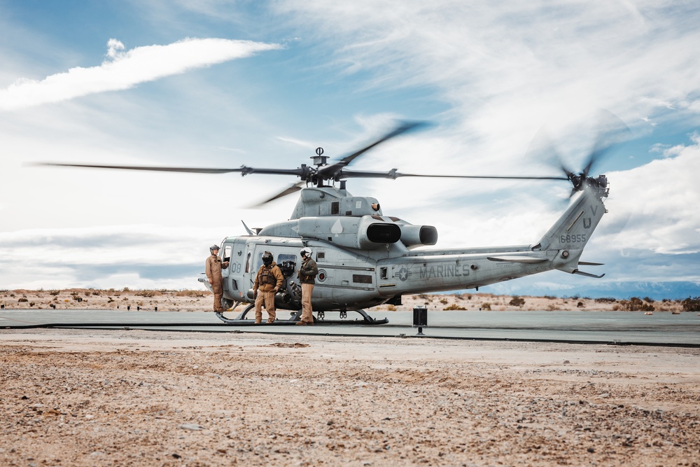 HMLA-267 Marines conduct maintenance on light attack helicopters during SLTE 2-24