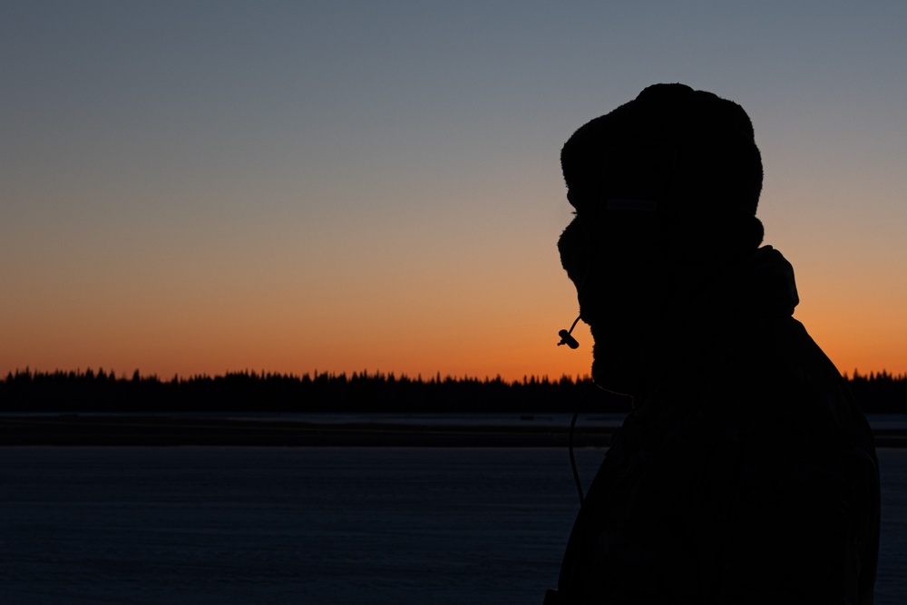 ARCTIC EDGE 24: 27th Special Operations Wing Airman Sunset Silhouette