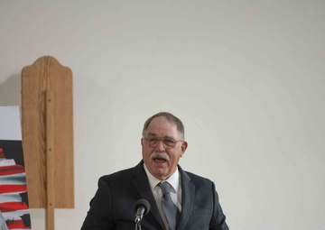 Jeff Dittmer, son of Robert Dittmer, delivers the eulogy at his father’s funeral.