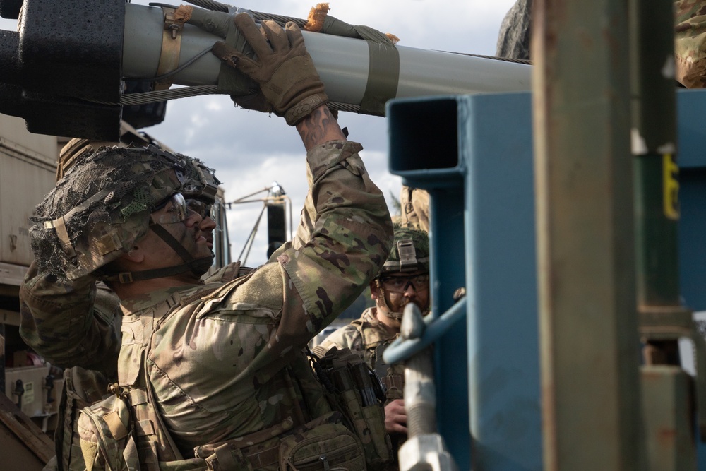 23rd Brigade Engineer Battalion Conduct a Mine Clearing Line Charge Live Fire Exercise