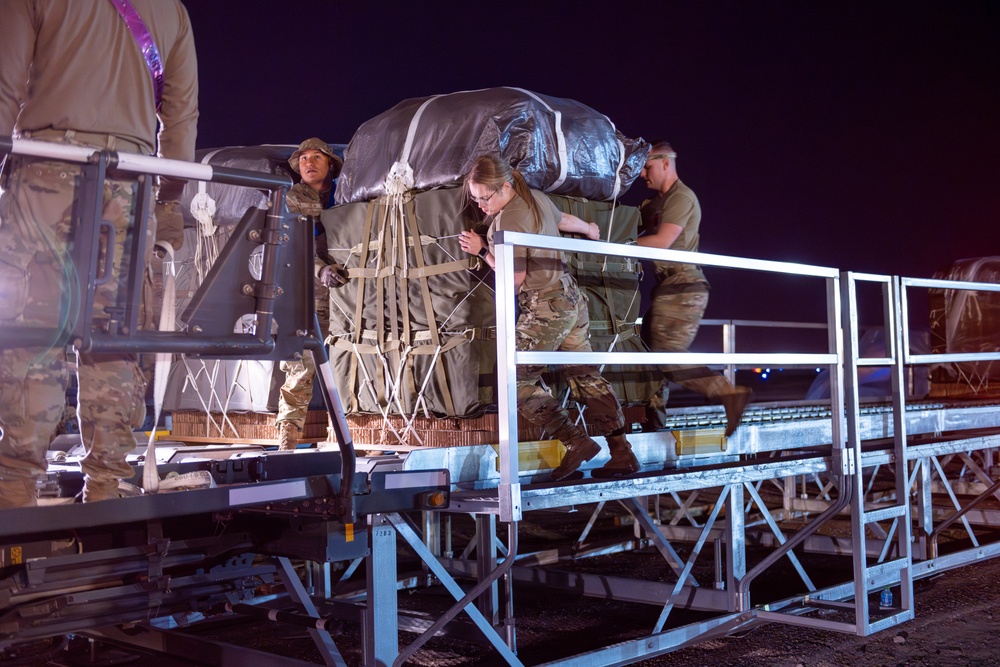 Airmen, Soldiers load AFCENT C-130s with humanitarian aid bound for Gaza