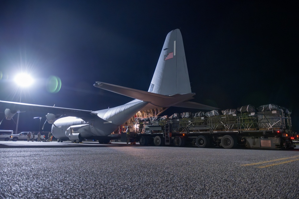 Airmen, Soldiers load AFCENT C-130s with humanitarian aid bound for Gaza