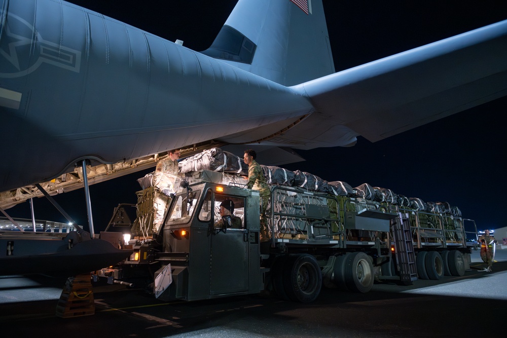 Airmen, Soldiers load AFCENT C-130s with humanitarian aid bound for Gaza