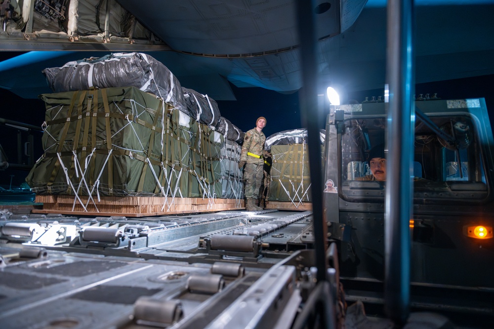 Airmen, Soldiers load AFCENT C-130s with humanitarian aid bound for Gaza