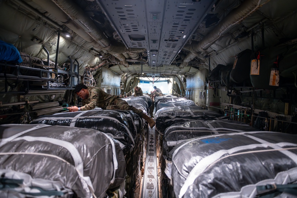 Airmen, Soldiers load AFCENT C-130s with humanitarian aid bound for Gaza