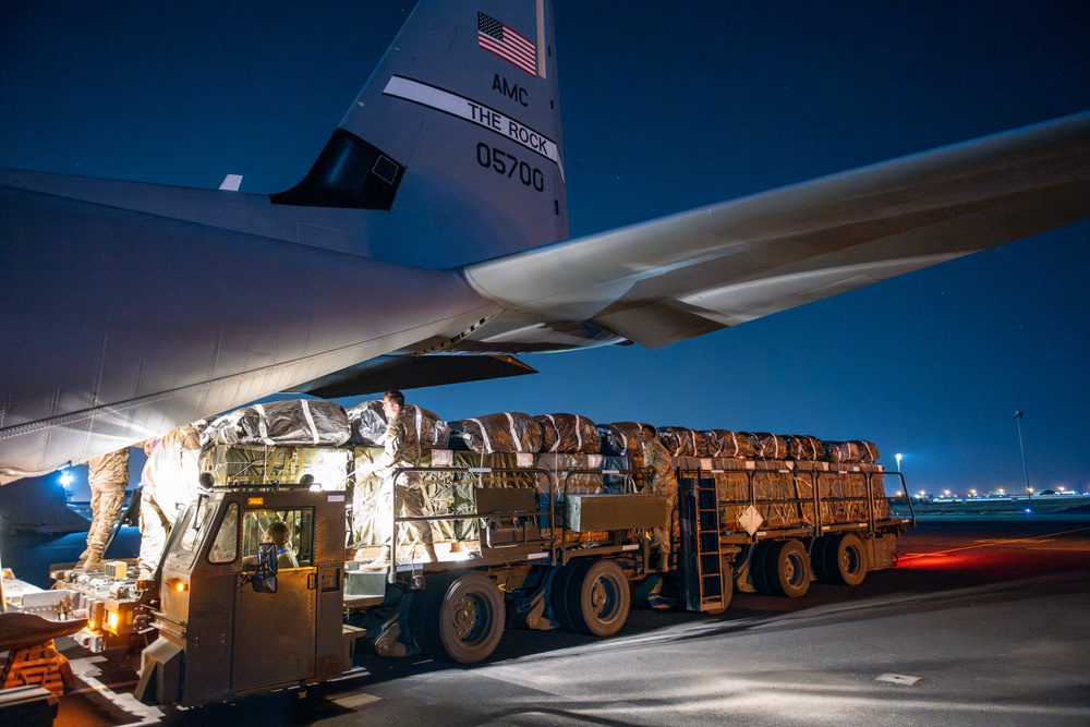 Airmen, Soldiers load AFCENT C-130s with humanitarian aid bound for Gaza