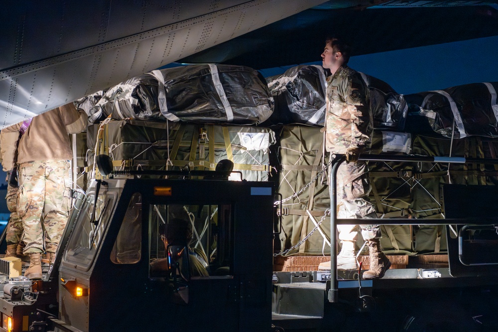 Airmen, Soldiers load AFCENT C-130s with humanitarian aid bound for Gaza