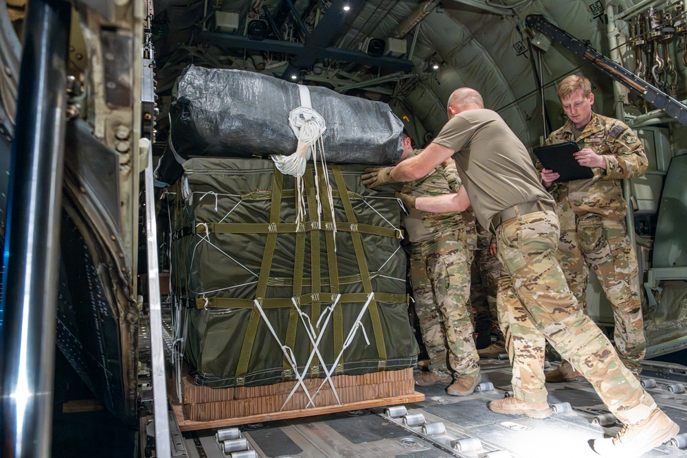 Airmen, Soldiers load AFCENT C-130s with humanitarian aid bound for Gaza