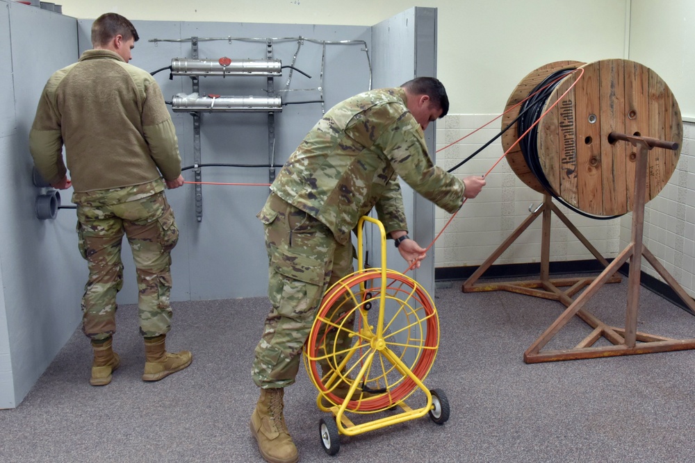 Cable Dawg instructors build confined space simulator