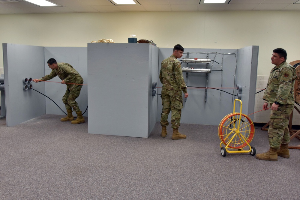 Cable Dawg instructors build confined space simulator