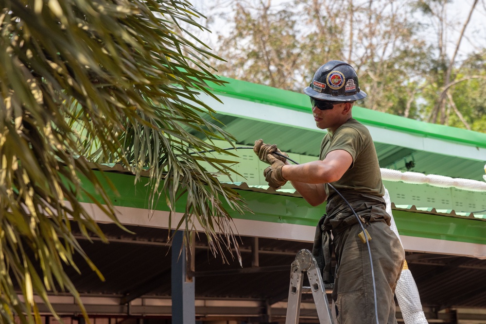 Cobra Gold 24; Marines with Marine Wing Support Squadron 171 work on electrical wiring and concrete prep