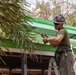 Cobra Gold 24; Marines with Marine Wing Support Squadron 171 work on electrical wiring and concrete prep