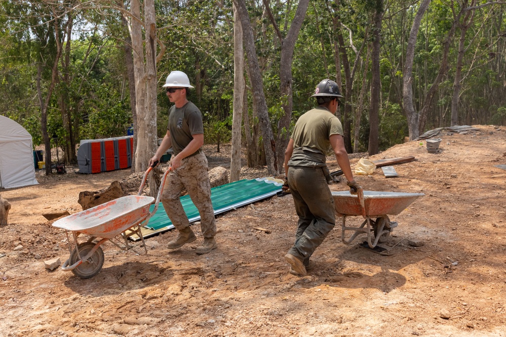 Cobra Gold 24; Marines with Marine Wing Support Squadron 171 work on electrical wiring and concrete prep