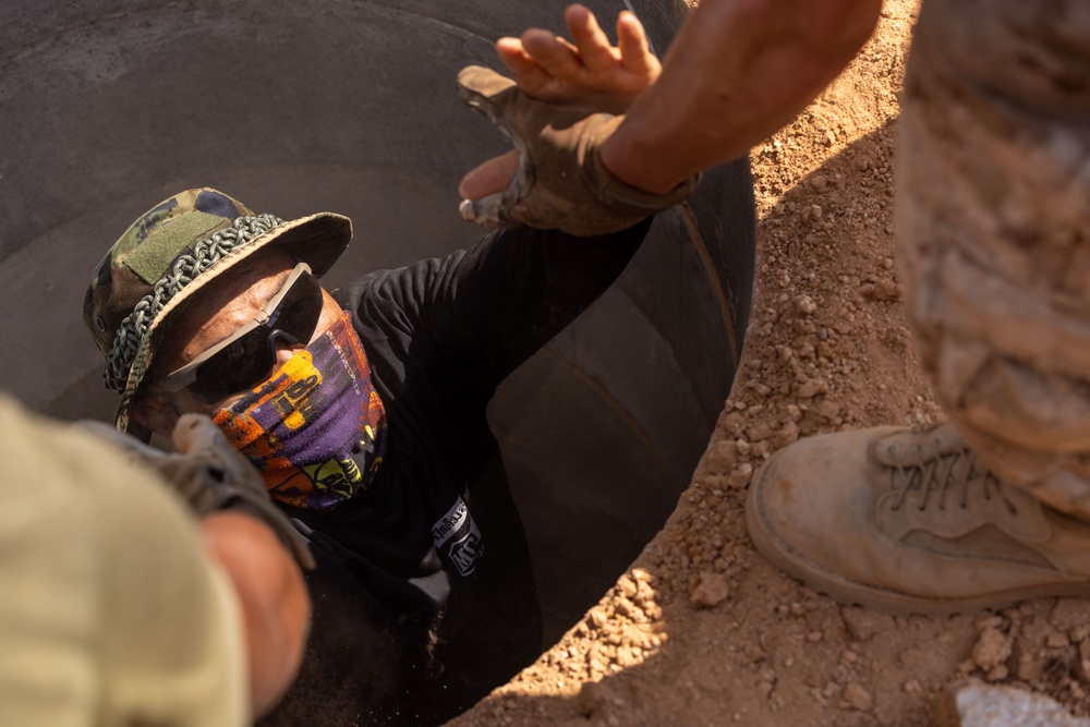 Cobra Gold 24; Marines with Marine Wing Support Squadron 171 work on electrical wiring and concrete prep