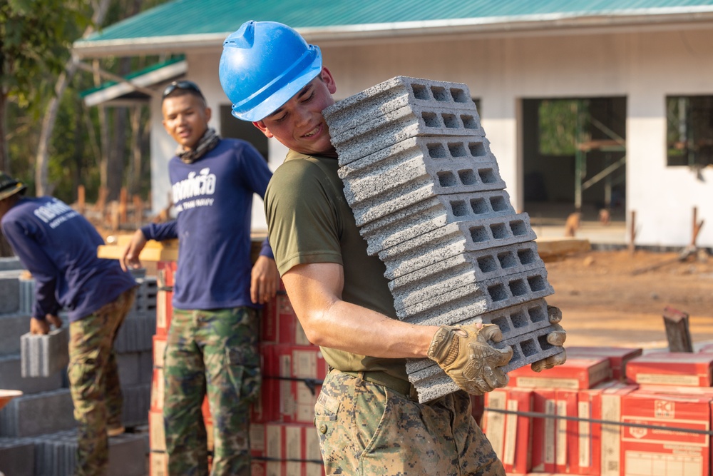 Cobra Gold 24; Marines with Marine Wing Support Squadron 171 lay concrete and do electrical work at the Ban Prakaet School