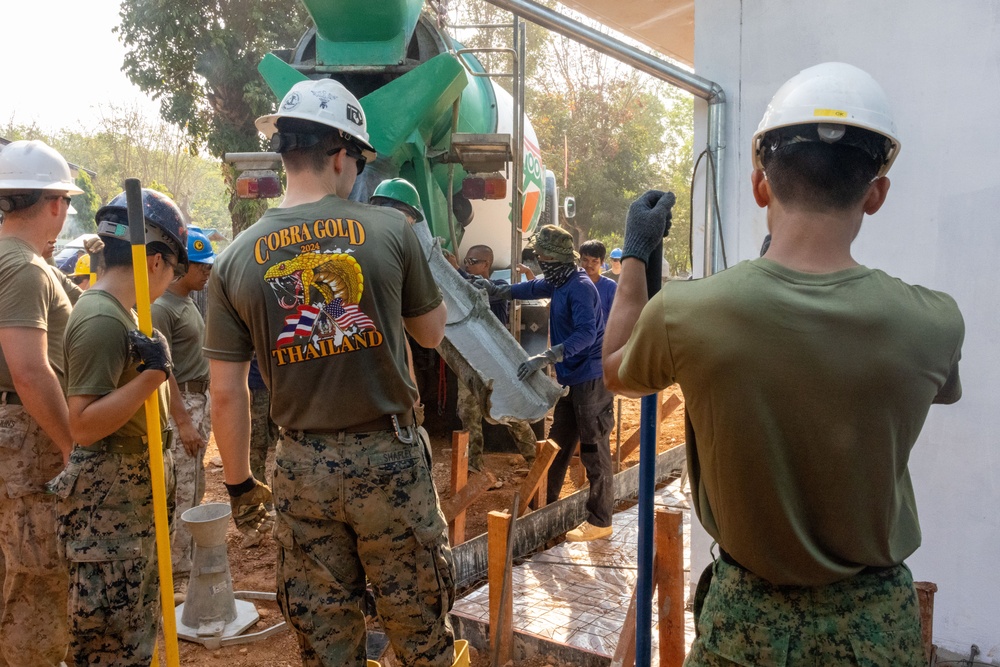 Cobra Gold 24; Marines with Marine Wing Support Squadron 171 lay concrete and do electrical work at the Ban Prakaet School