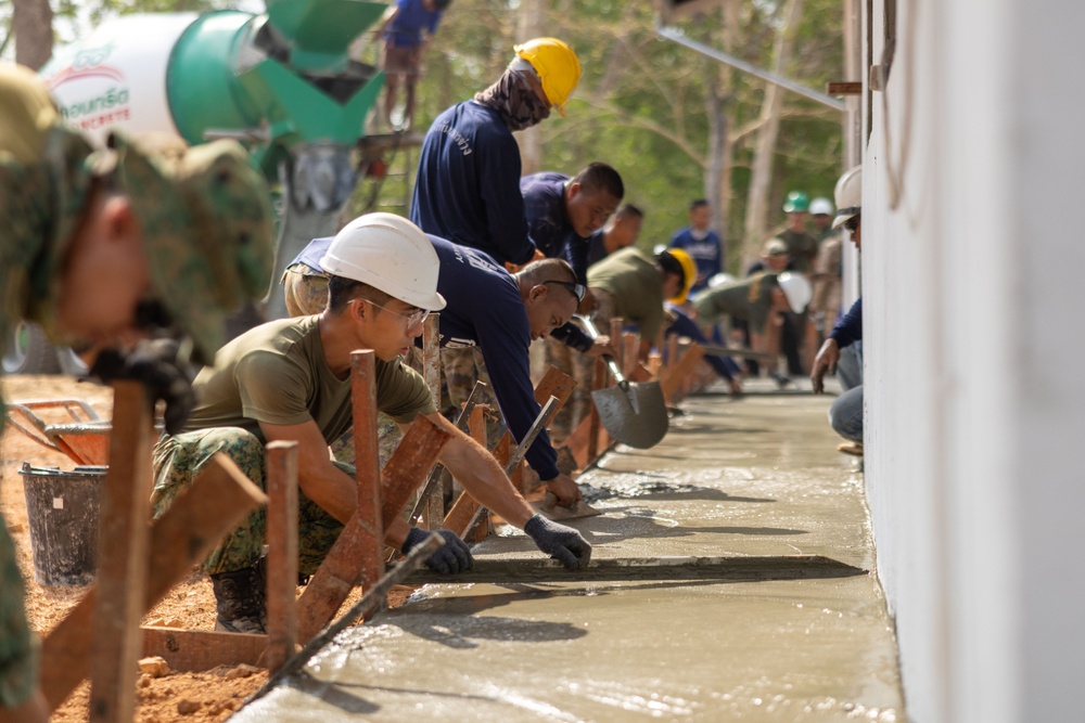 Cobra Gold 24; Marines with Marine Wing Support Squadron 171 lay concrete and do electrical work at the Ban Prakaet School